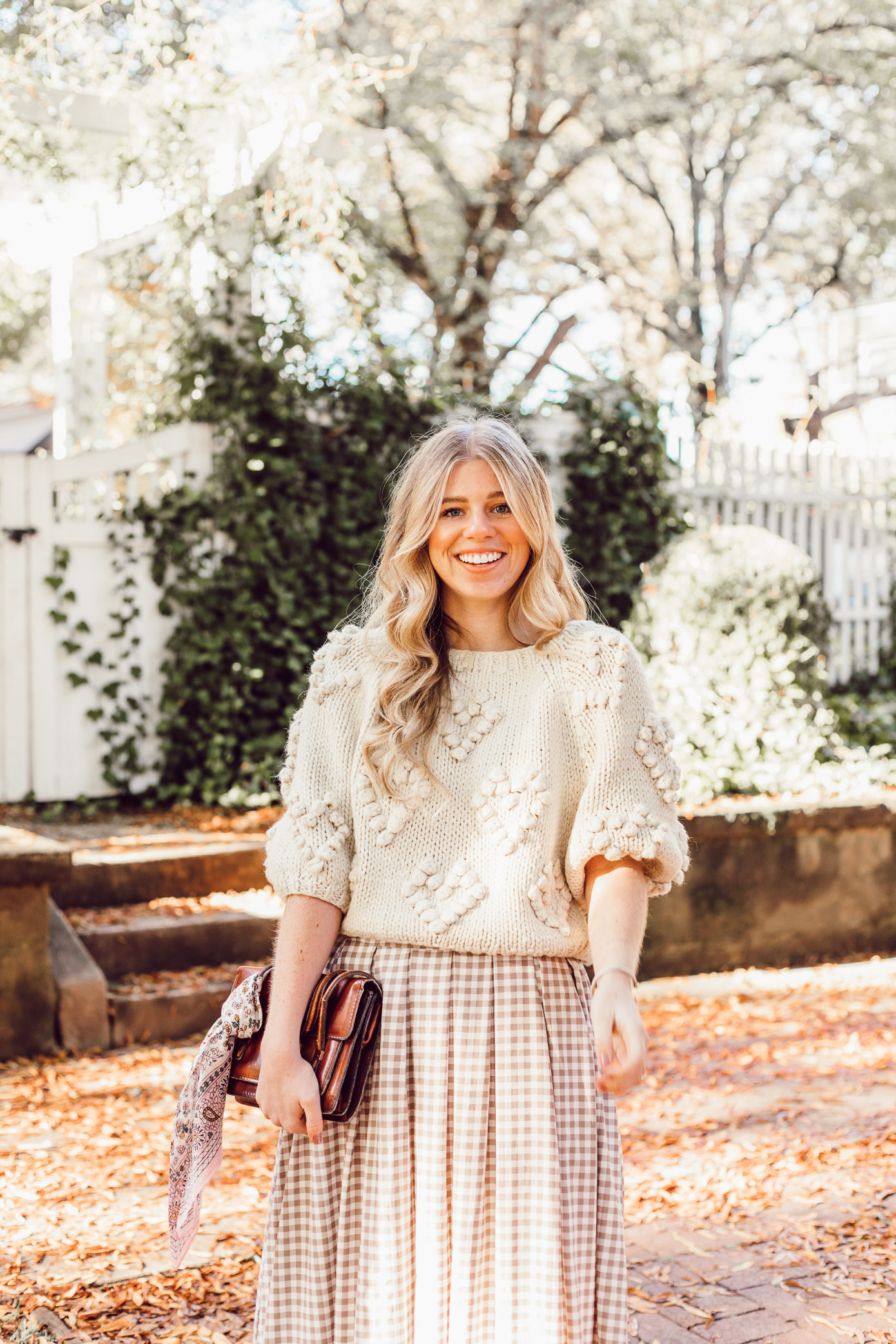 Spice Up Your Winter Date Night Look with a Winter Maxi Skirt featured on Louella Reese Blog | Gingham Maxi Skirt, Pommed Heart Sweater