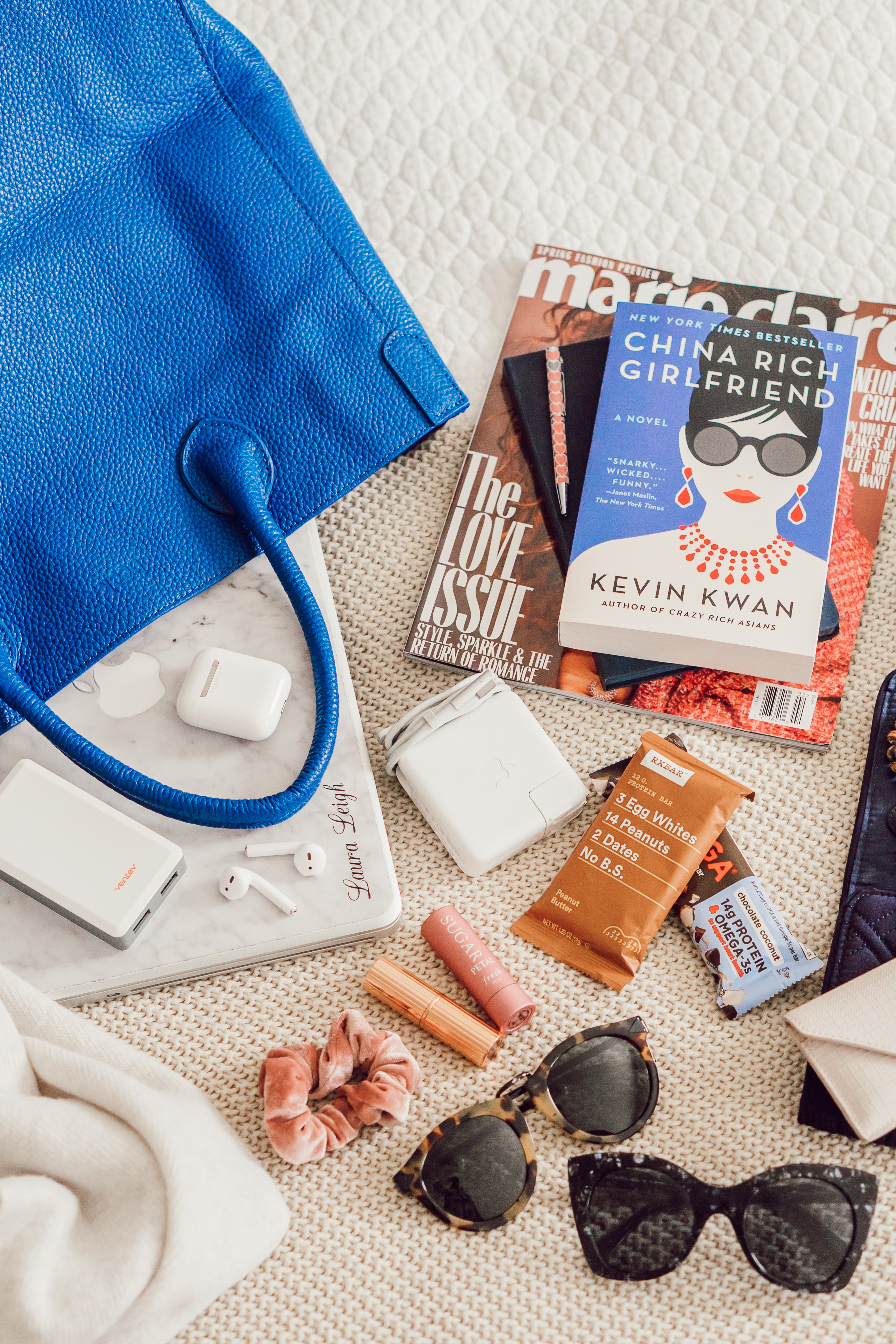 What's in my NYFW Carry On Bag - What you need to put in your carry on bag when attending NYFW featured by popular NC travel blogger, Laura Leigh of Louella Reese