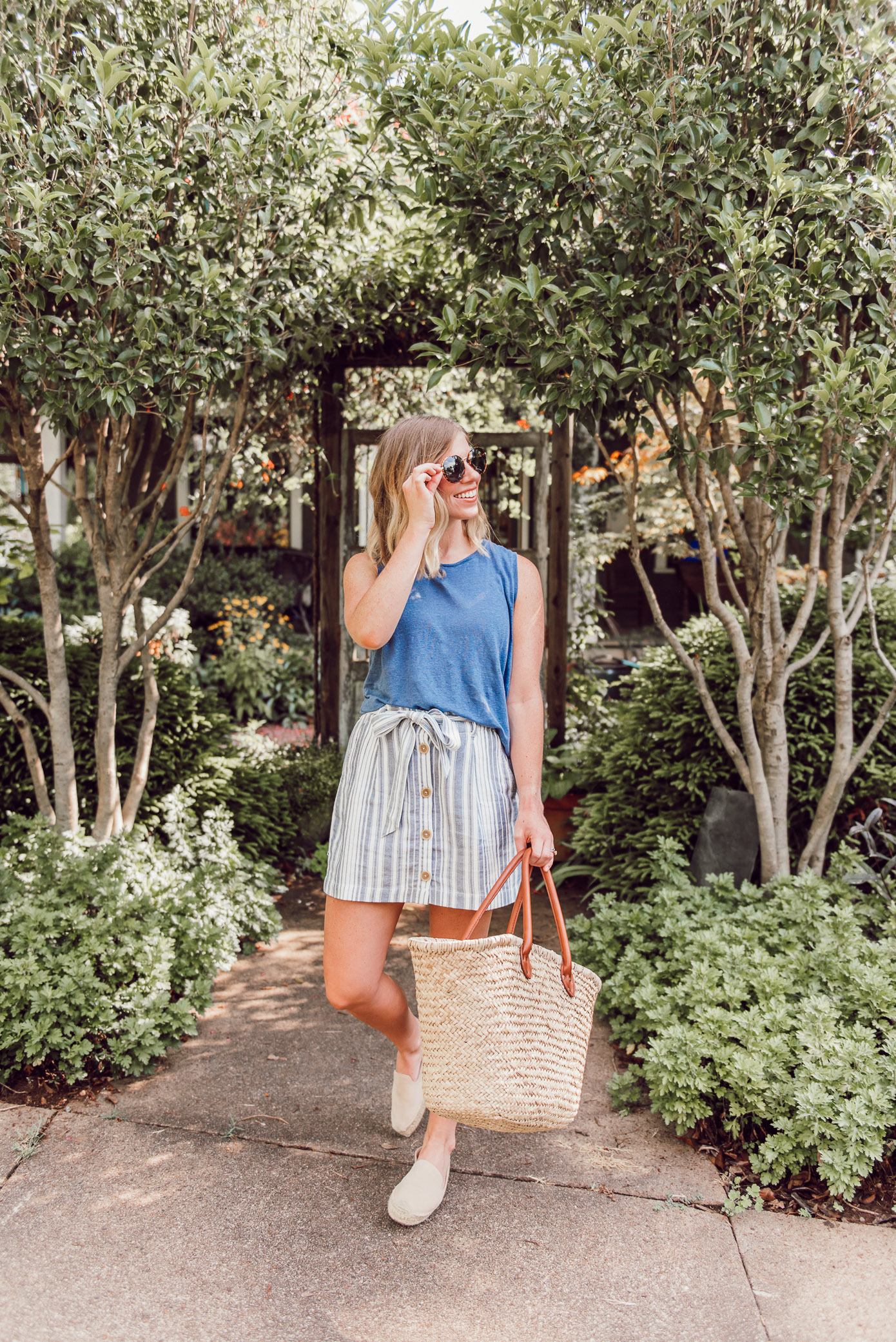 Summer linen clothing pieces that are lightweight and easy to throw on | linen tank, linen mini skirt, straw tote, neutral espadrilles | Louella Reese
