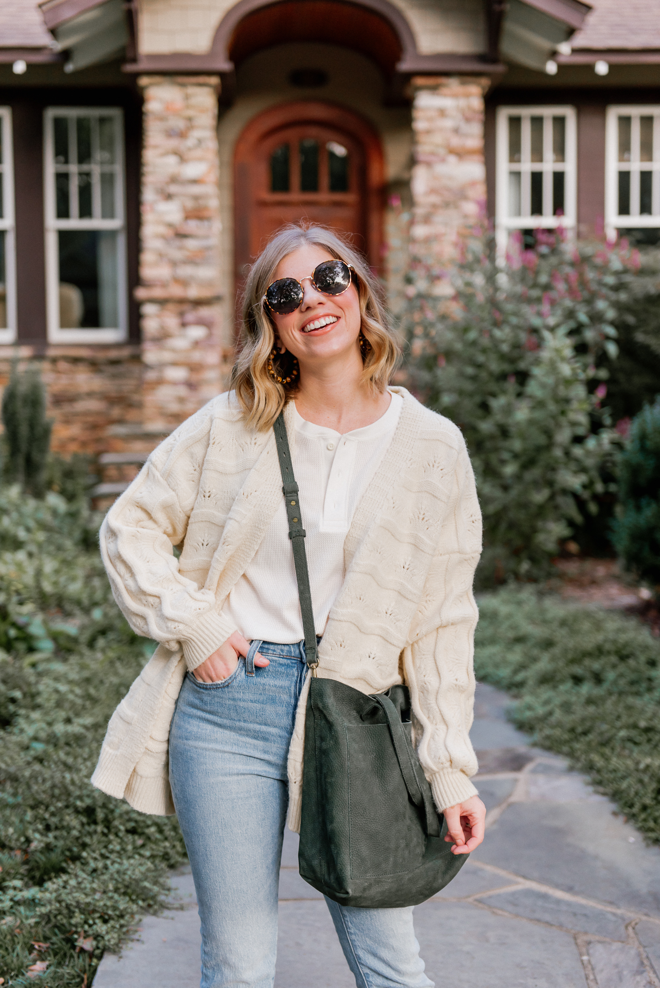 Six Cozy Fall Cardigans | Casual Fall Outfit featuring Ivory Knit Cardigan, Waffle Henley, Demi-Boot Crop Jeans, Olive Leather Tote | Louella Reese