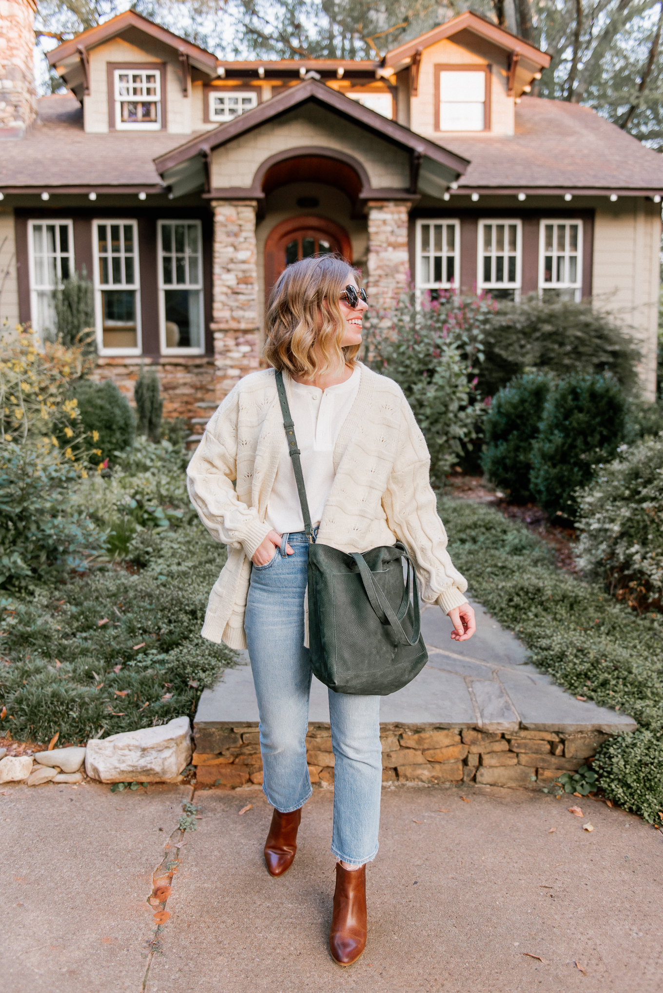 Six Cozy Fall Cardigans | Casual Fall Outfit featuring Ivory Knit Cardigan, Waffle Henley, Demi-Boot Crop Jeans, Cognac Leather Booties, Olive Leather Tote | Louella Reese