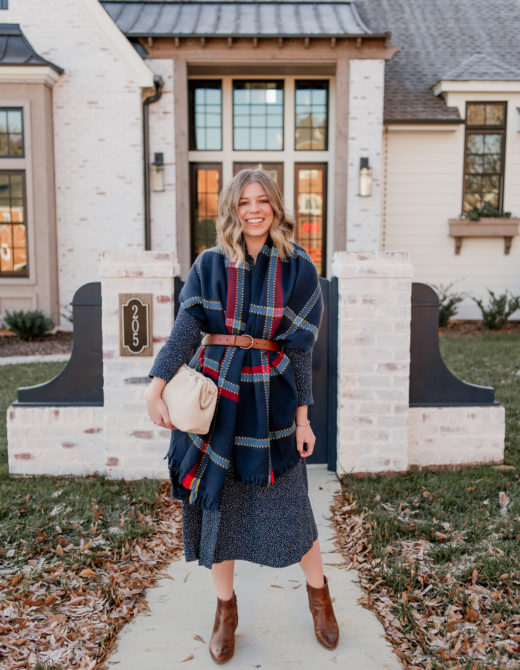 Laura Leigh of Louella Reese shares how to style a scarf as vest this winter season | navy check scarf, navy shirt dress, cognac leather chelsea boots