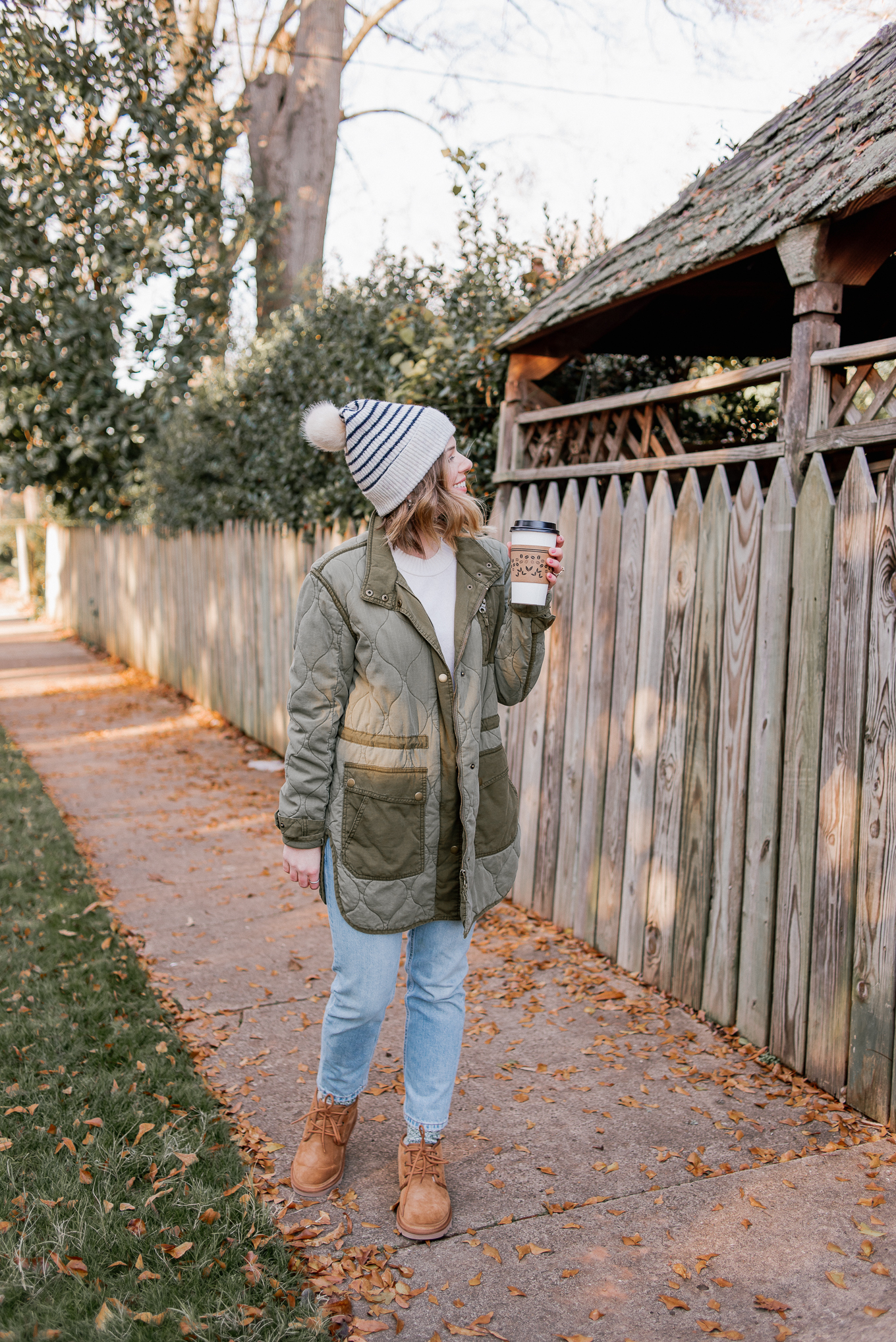 Laura Leigh Elliott of Louella Reese pairs the Ugg Neumel winter boots with a quilted field jacket and beanie for a cute winter look