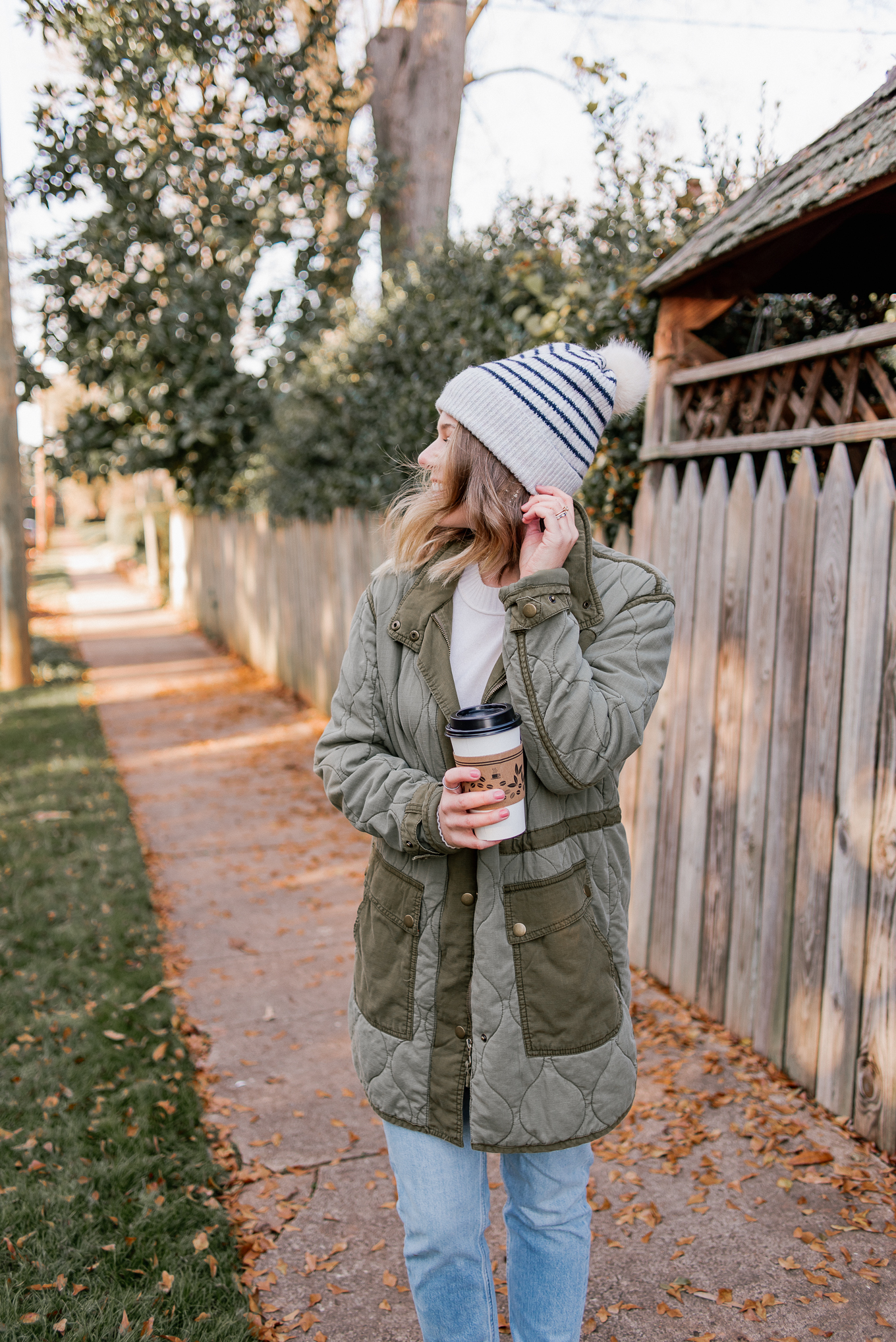 Laura Leigh Elliott of Louella Reese layers a cozy cashmere sweater from Everlane with a quilted field jacket and beanie