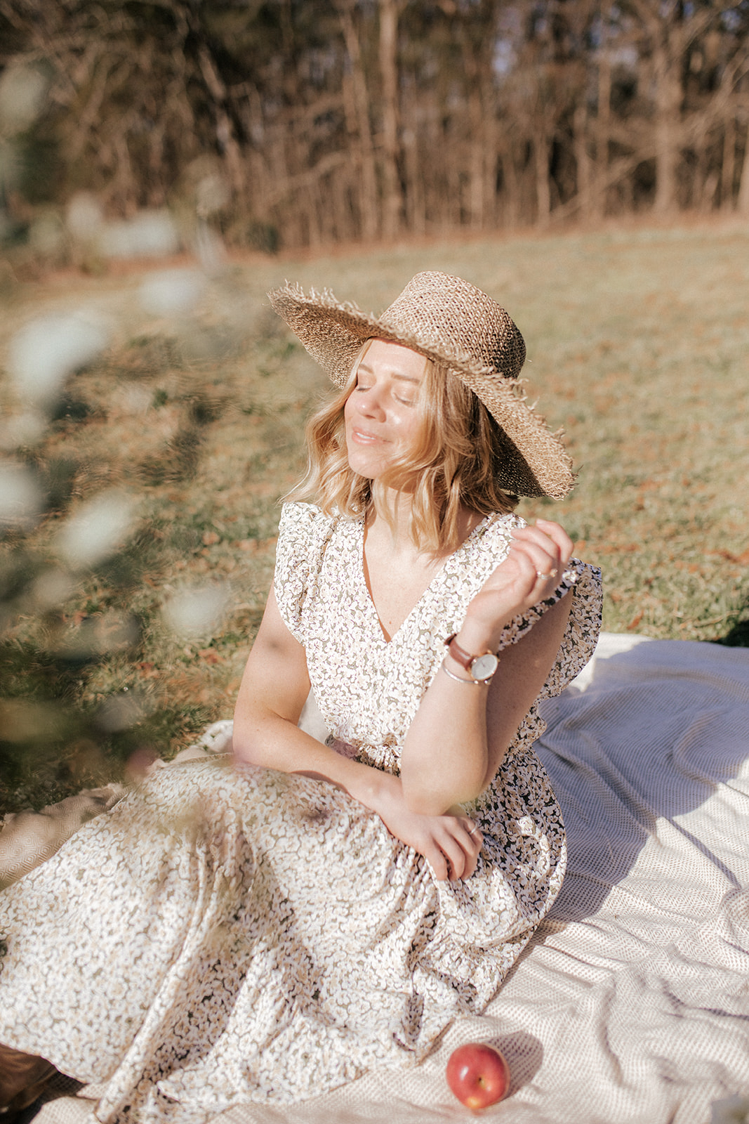 feminine spring outfit, lack of color straw hat | Louella Reese